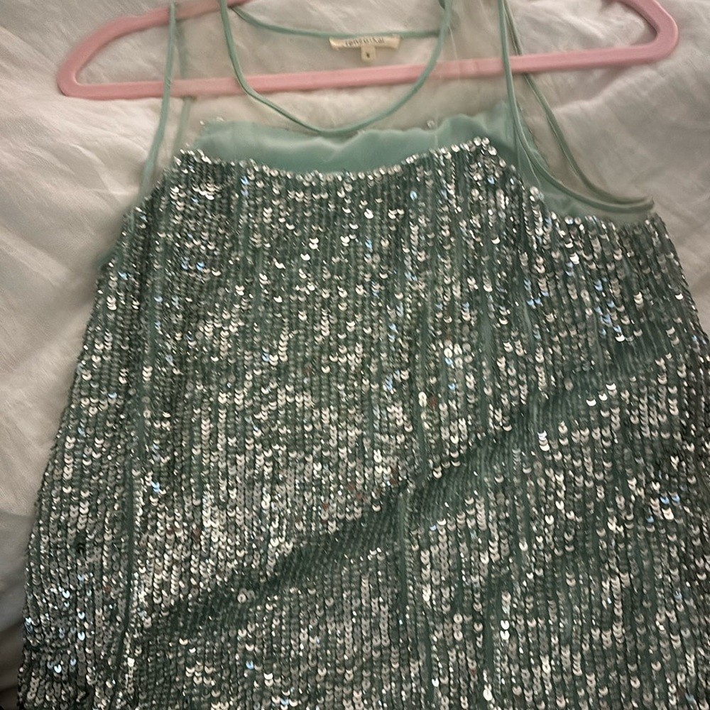 Reno £ Kai sequin top